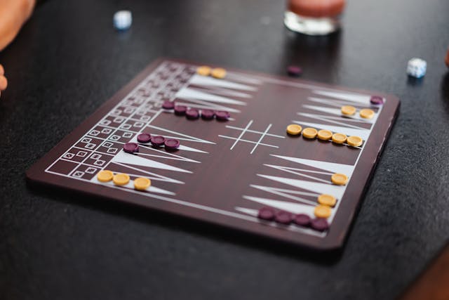 Backgammon board with checkers and dice