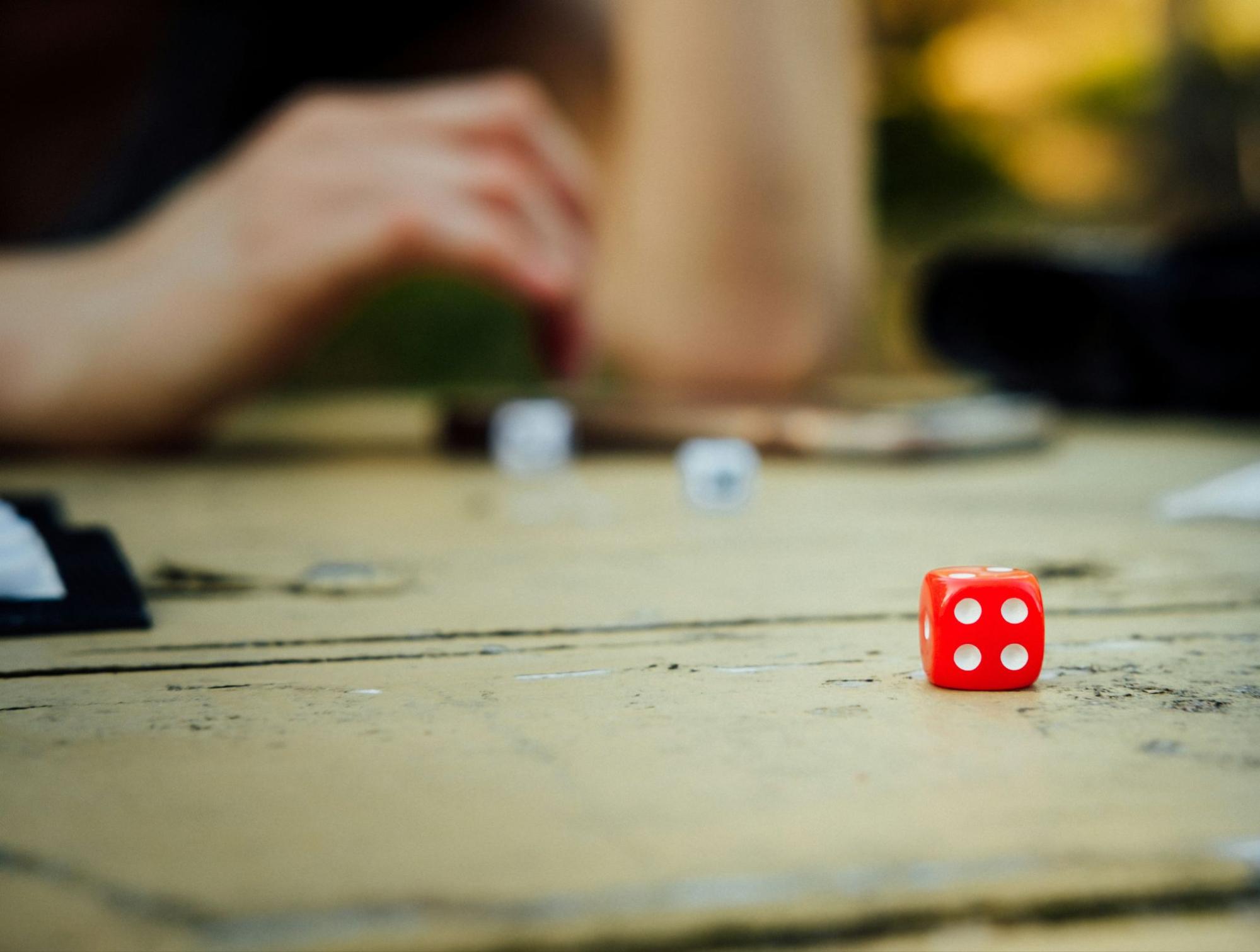 Red dice on a tabletop