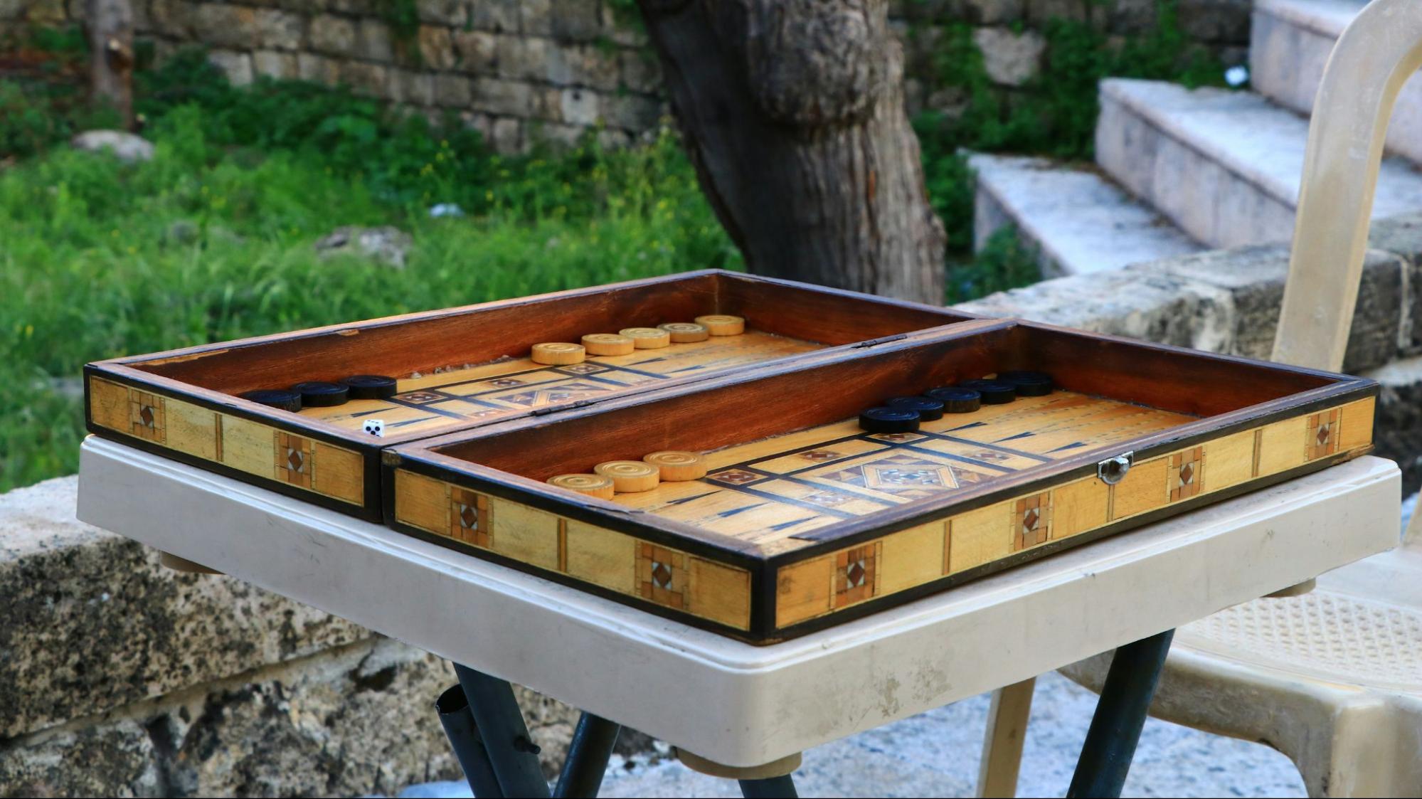 Backgammon board set up outdoors